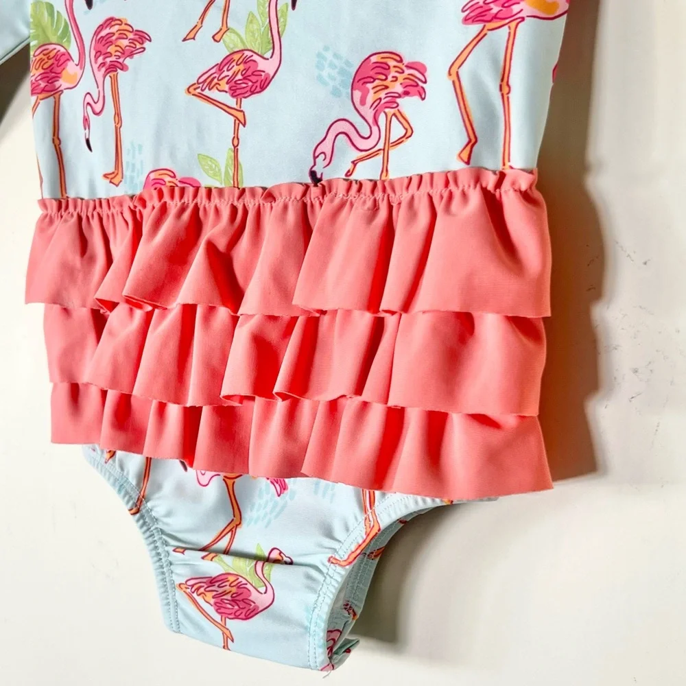 Mud Pie Baby Girls Flamingo One-Piece Rash Guard Swimsuit with Ruffle Butt